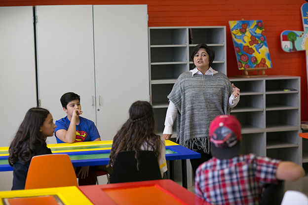 Veronic Rayas teaches a group of children at Centro San Juan Diego