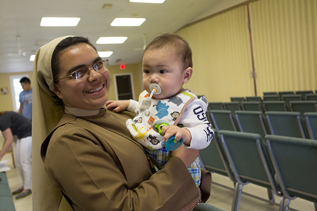 Catholic Sister Maryud with Baby