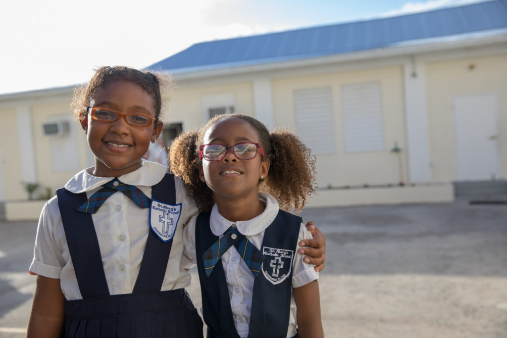 Young children smiling 