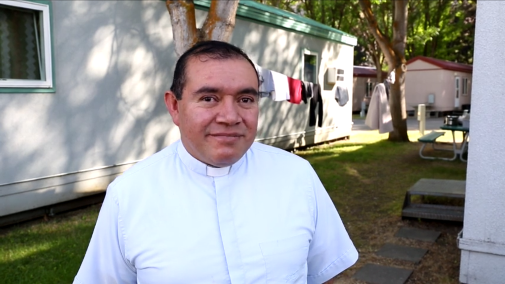 Fr. Alejandro "Alex" Trejo in migrant camp in Diocese of Yakima