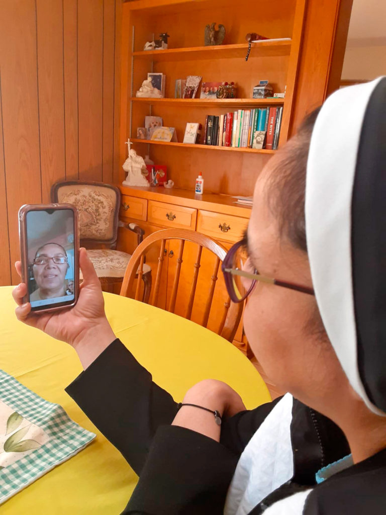 1918 Flu vs Coronavirus, Catholic Sister video chats on her phone