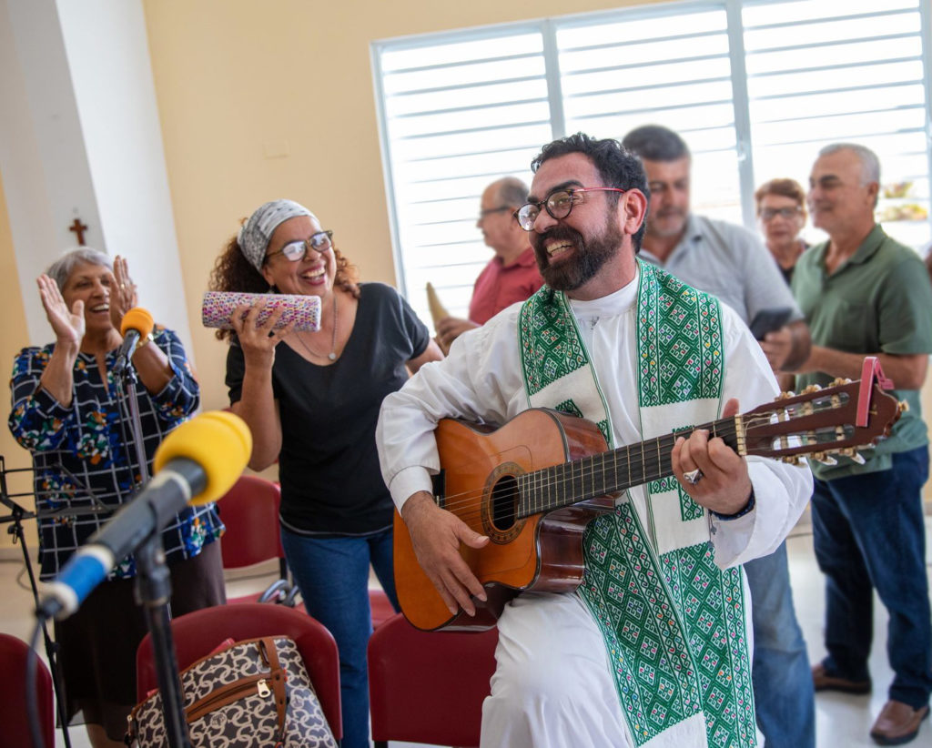 choir of San Gerardo Mayela with Father Edmundo in Aguas Buenas, Puerto Rico